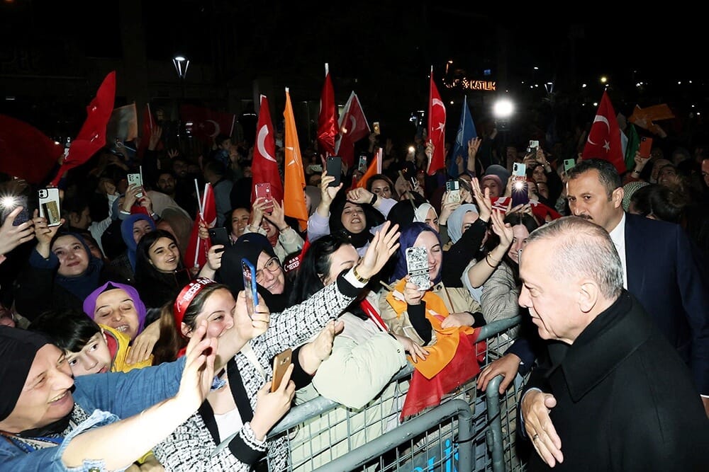 Erdogan supporters take to the streets of Ankara in support - Reuters
