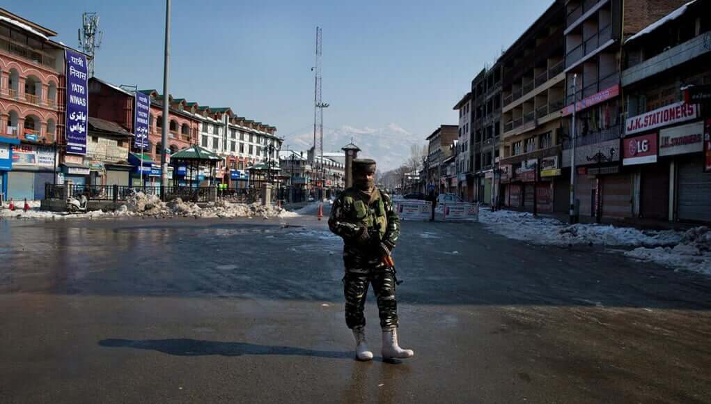 Indian kashmir article 370 attrocities army men standing, army in jammu and kashmir, article 370 abrogation, indian union government, ladakh state, union territory news, india news, kashmir news,