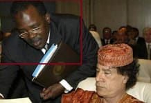 Bashir Saleh Bashir with Moammar Gaddafi