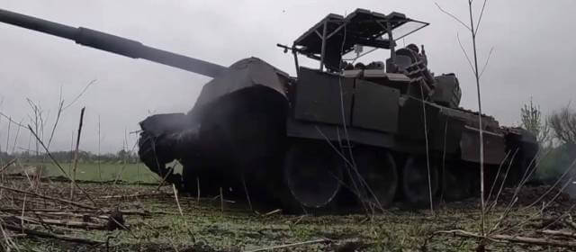 Russian T-72B3 tanks equipped with "Contact-1" dynamic protection