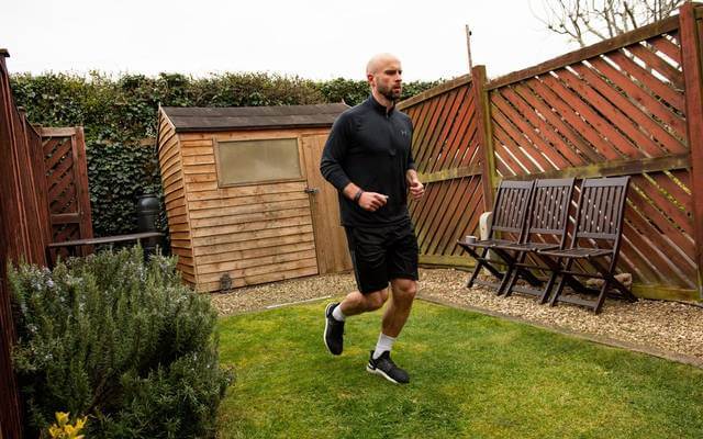 British javelin thrower runs marathon in his garden