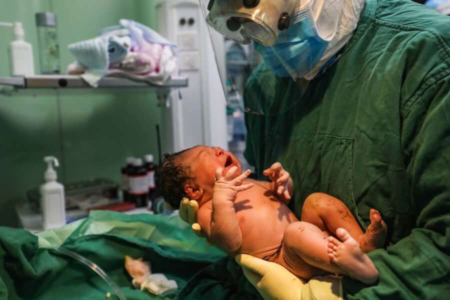 Between A Rock and a Hard place: Giving Birth in a Pandemic