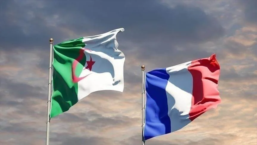 algerian and french flag waving