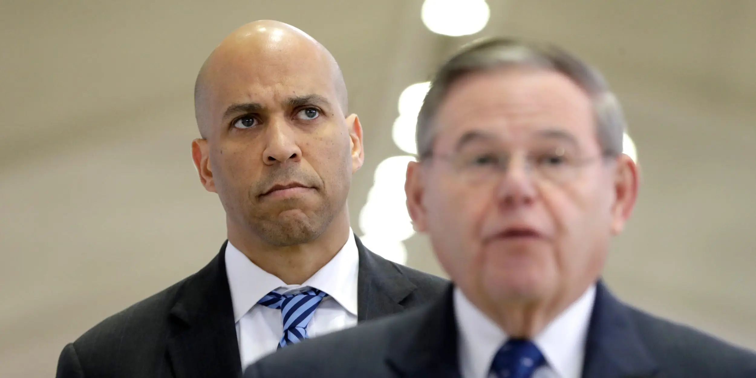 Cory-Booker-stands-against-Bob-Menendez